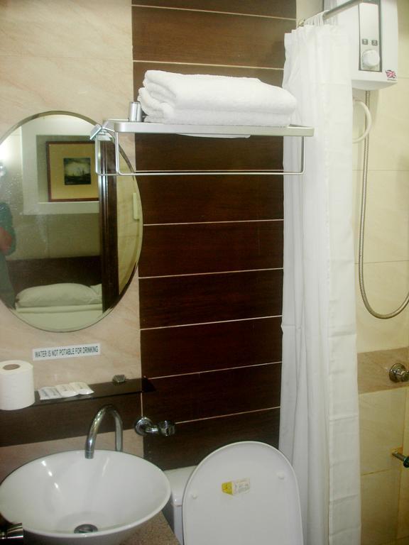 Roxas Midtown Hotel Værelse billede