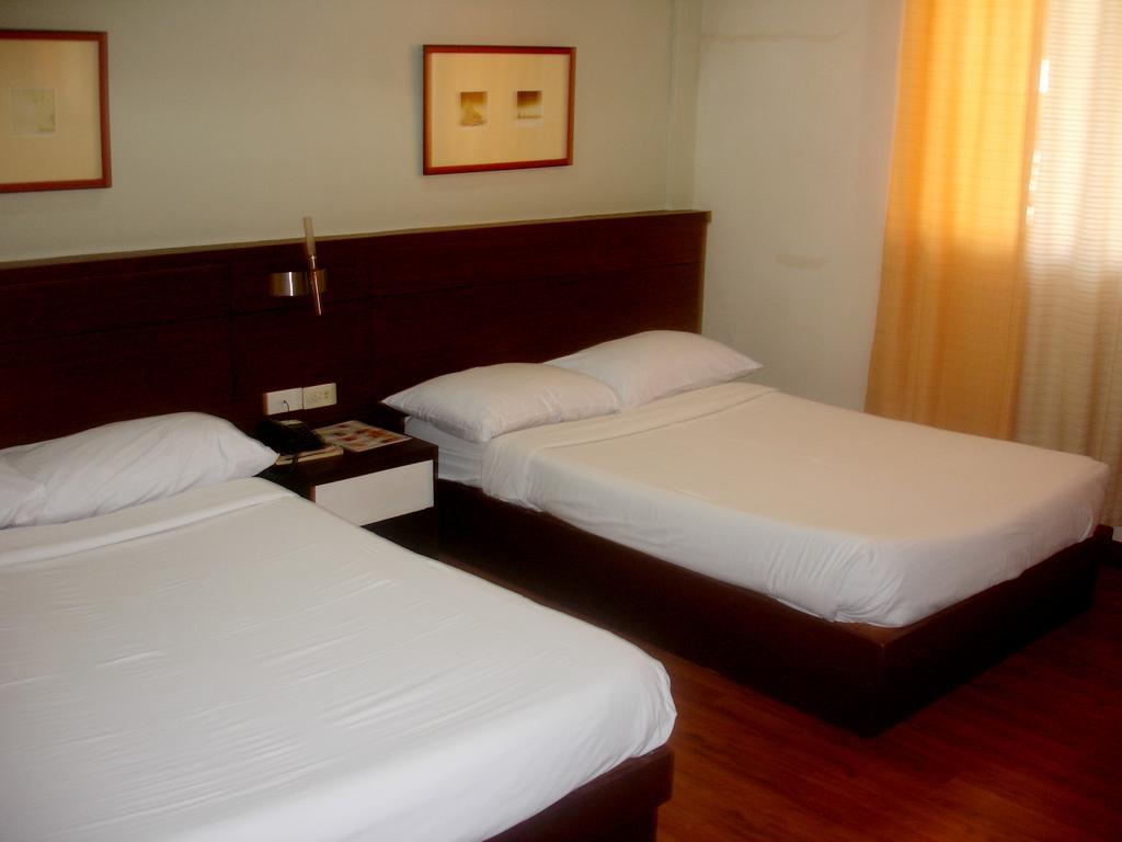 Roxas Midtown Hotel Værelse billede