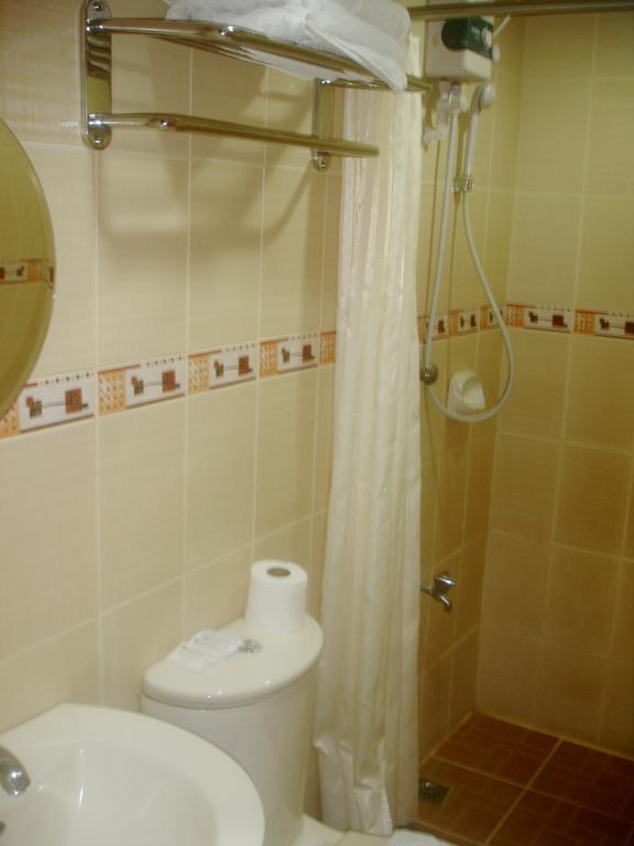 Roxas Midtown Hotel Værelse billede