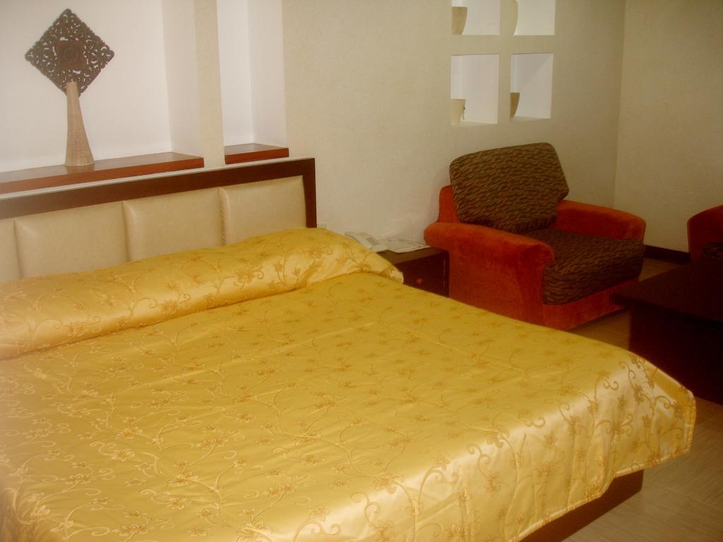 Roxas Midtown Hotel Værelse billede