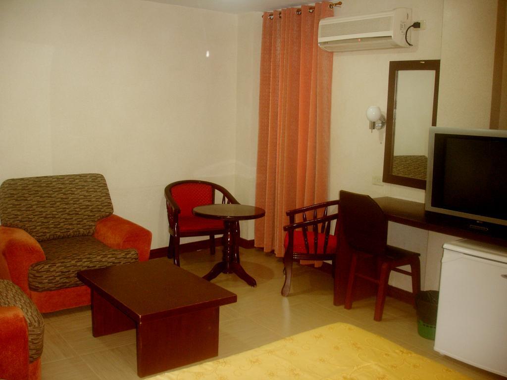 Roxas Midtown Hotel Værelse billede